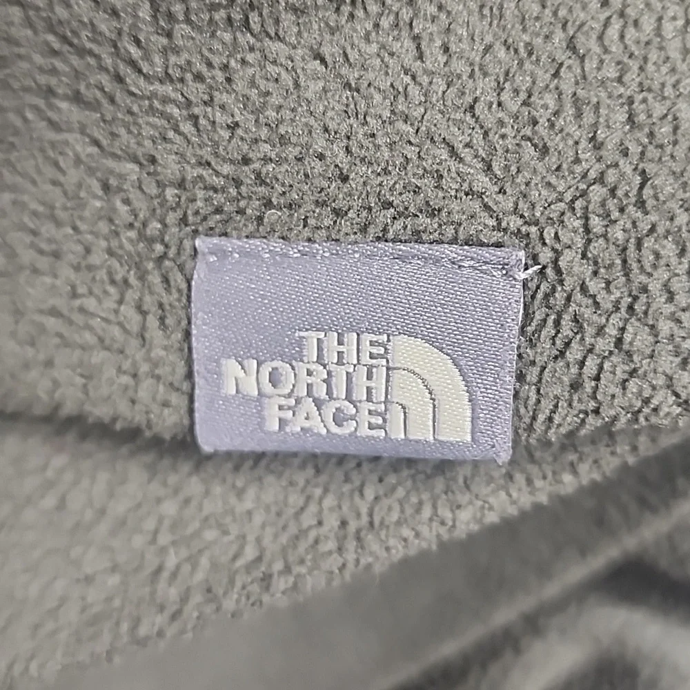 The North Face olive green embroidered  long sleeve hooded sweatshirt.